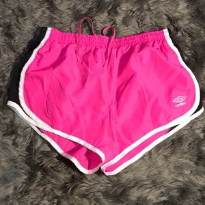 Pink and black Umbro athletic shorts